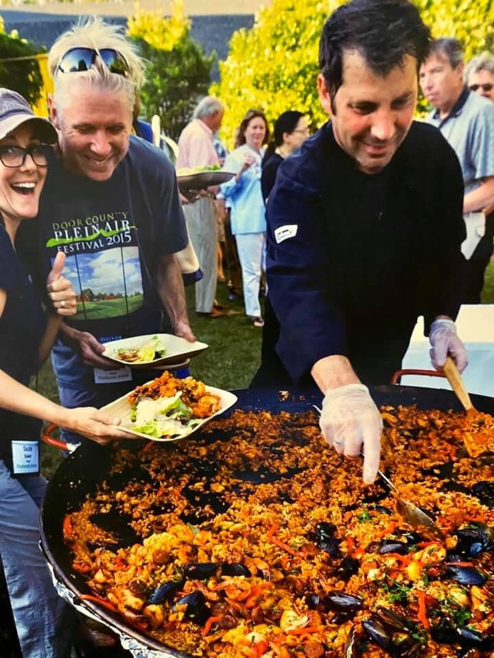 people enjoying food outside