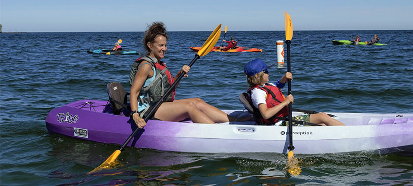 woman and child kayaking