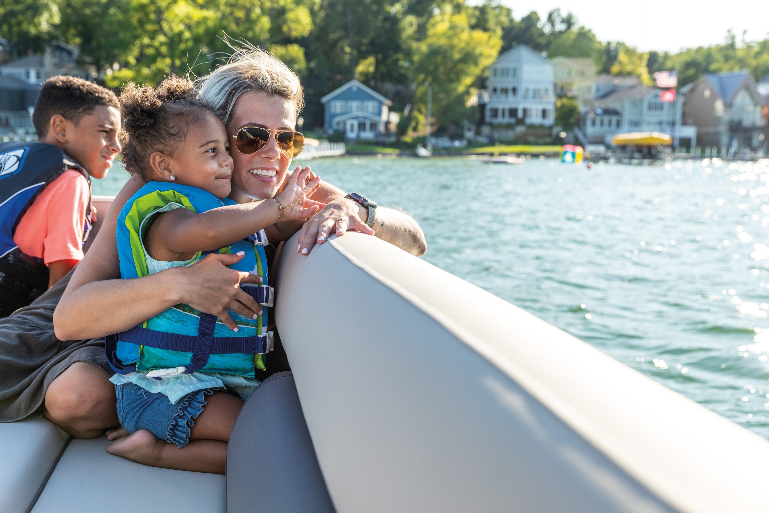 mom and kids on a boat