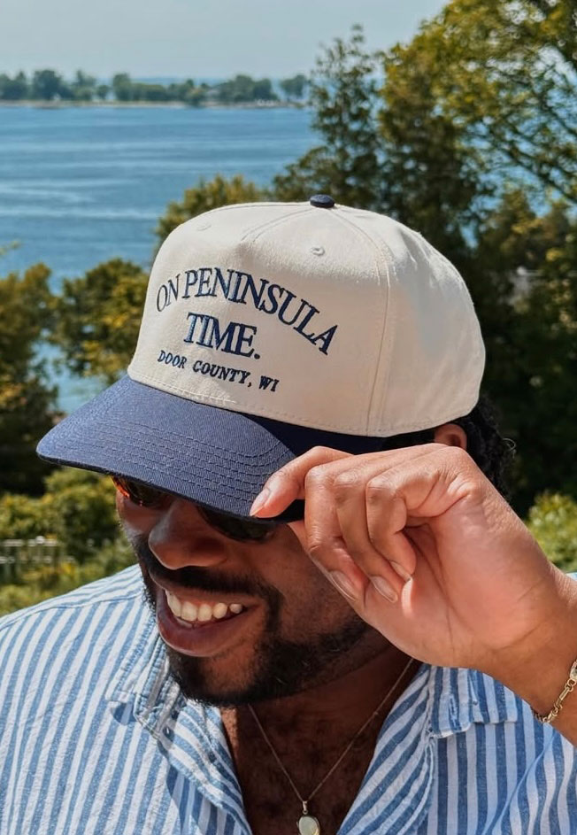 Man wearing hat from The Door Stop