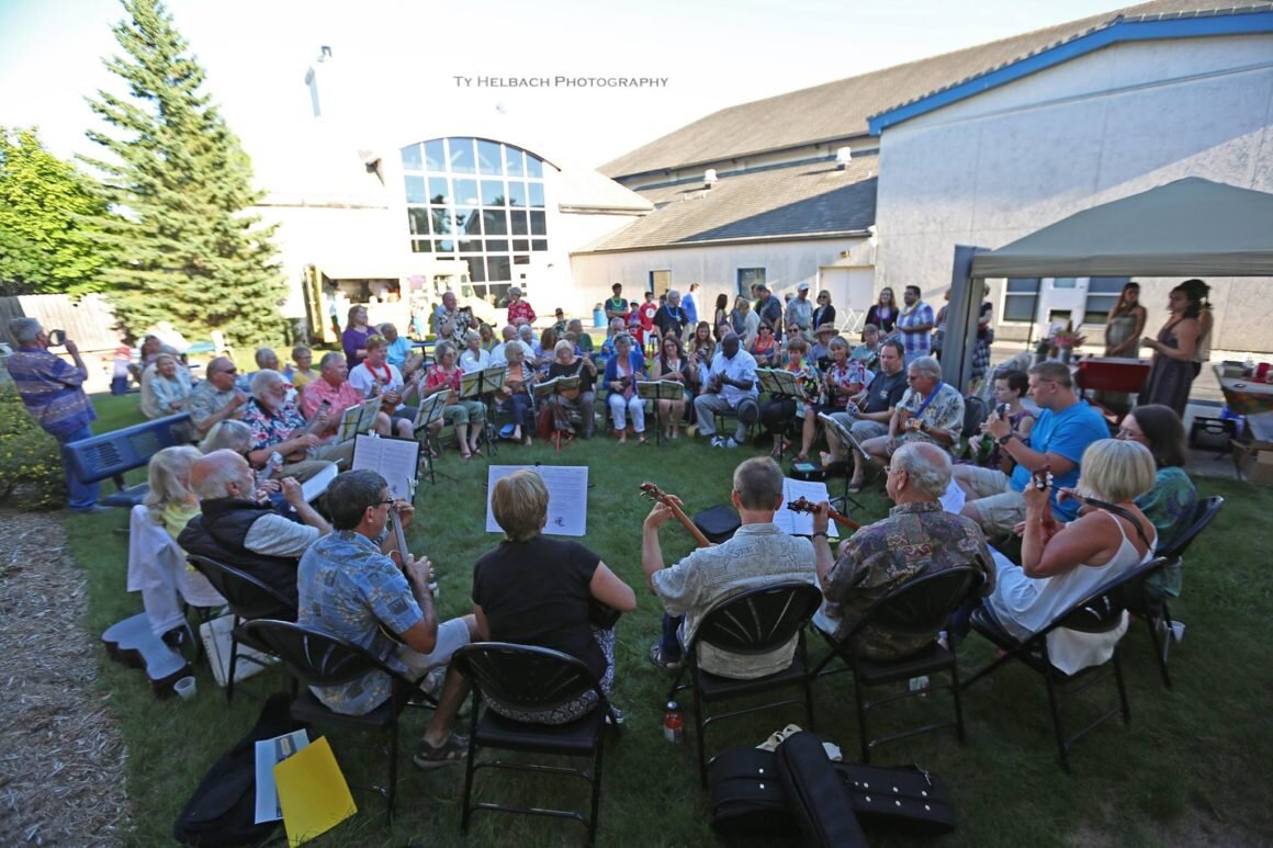 people playing ukulele's at Door Community Auditorium