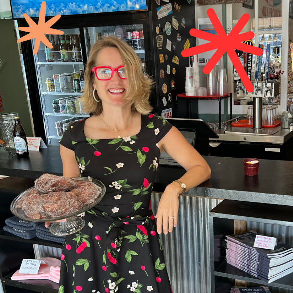 woman holding pastries