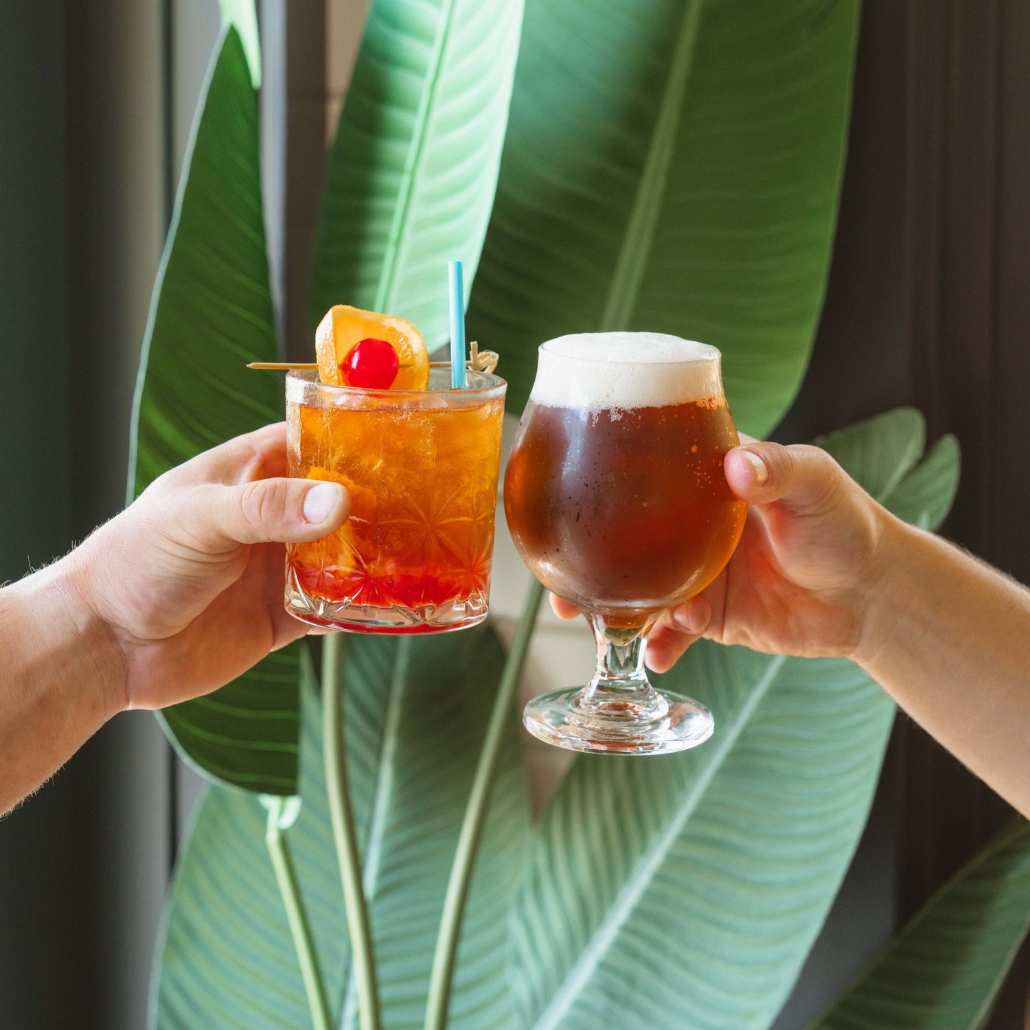 clinking mixed drinks