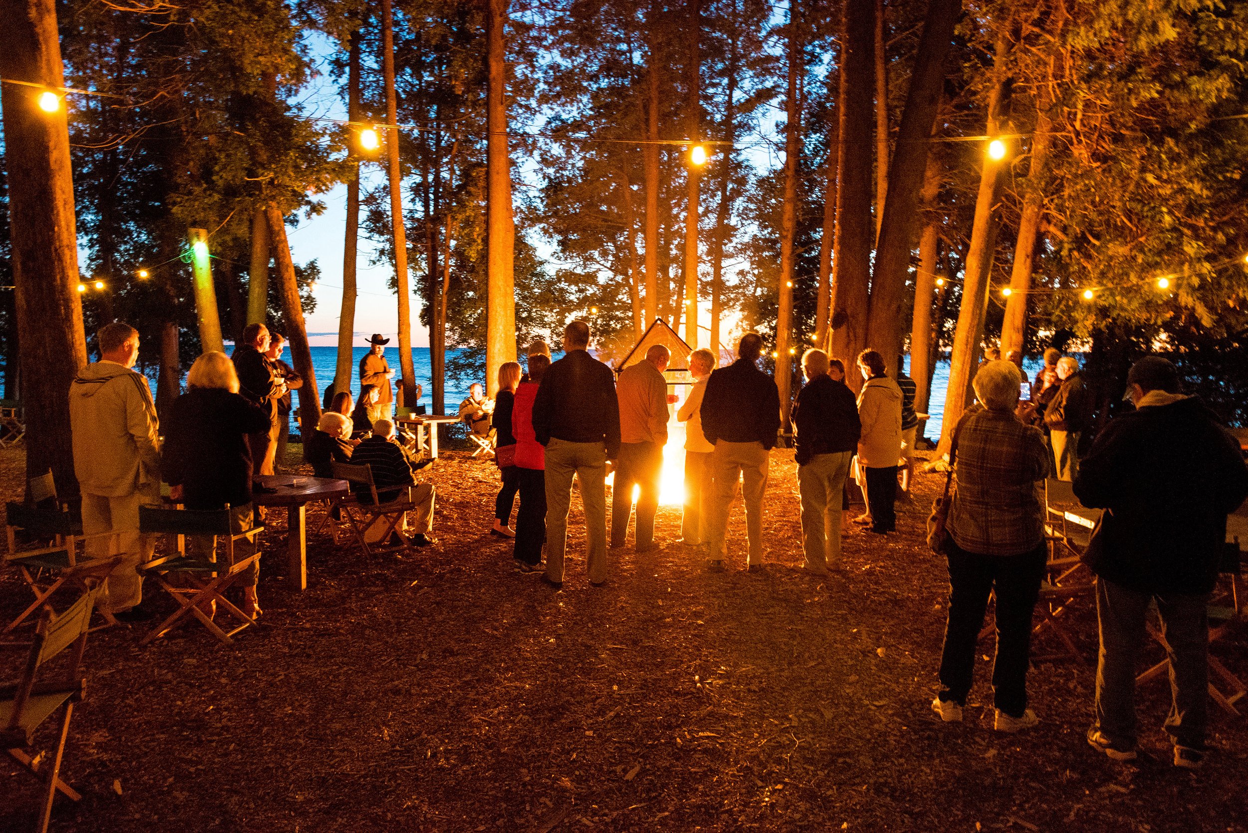 people at a bonfire