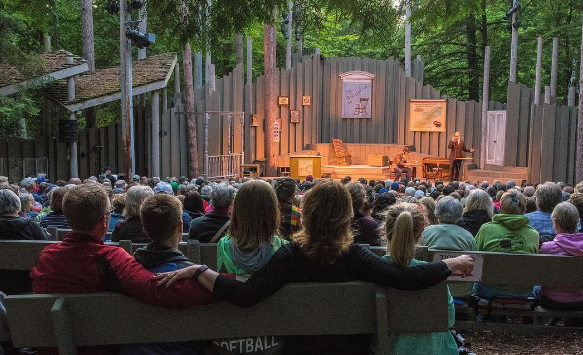 people watching a play