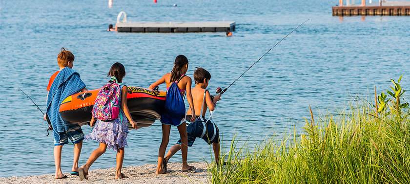 kids walking on Sister Bay Beach