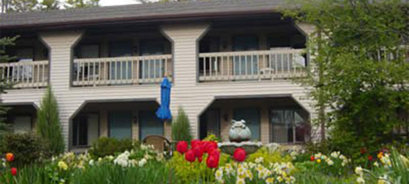 flower garden at The Coachlite Inn & Suites