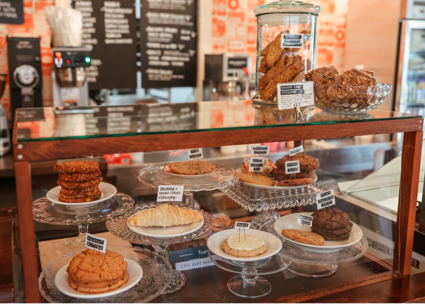 Coffee shop bakery case will with cookies, pastries and other snacks