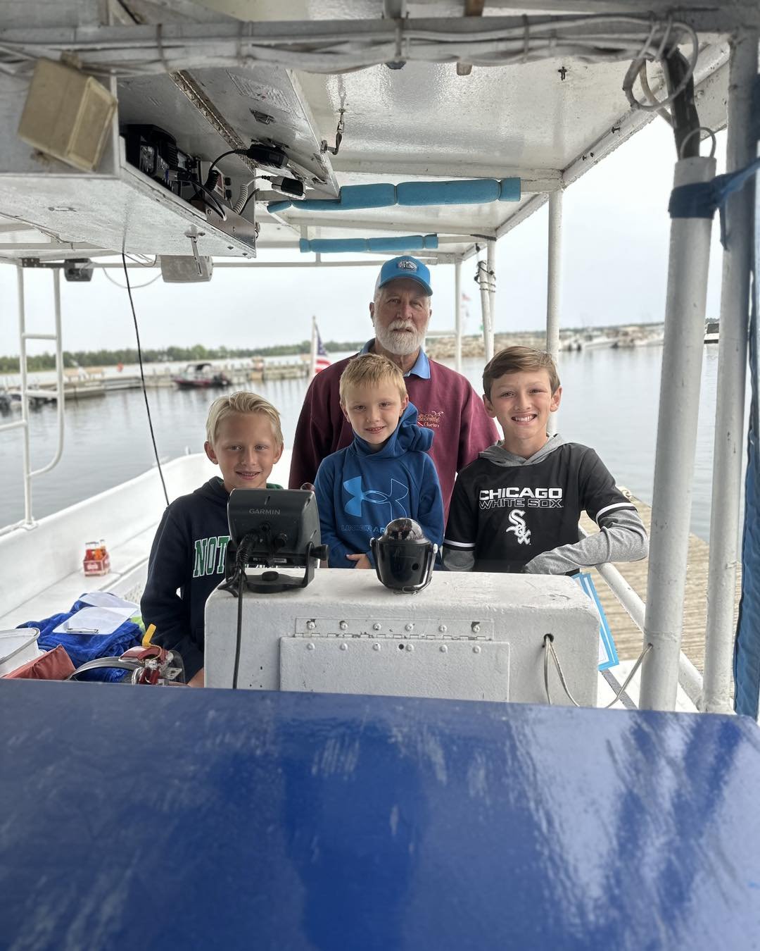family driving boat